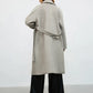 Loose wool coat with belt